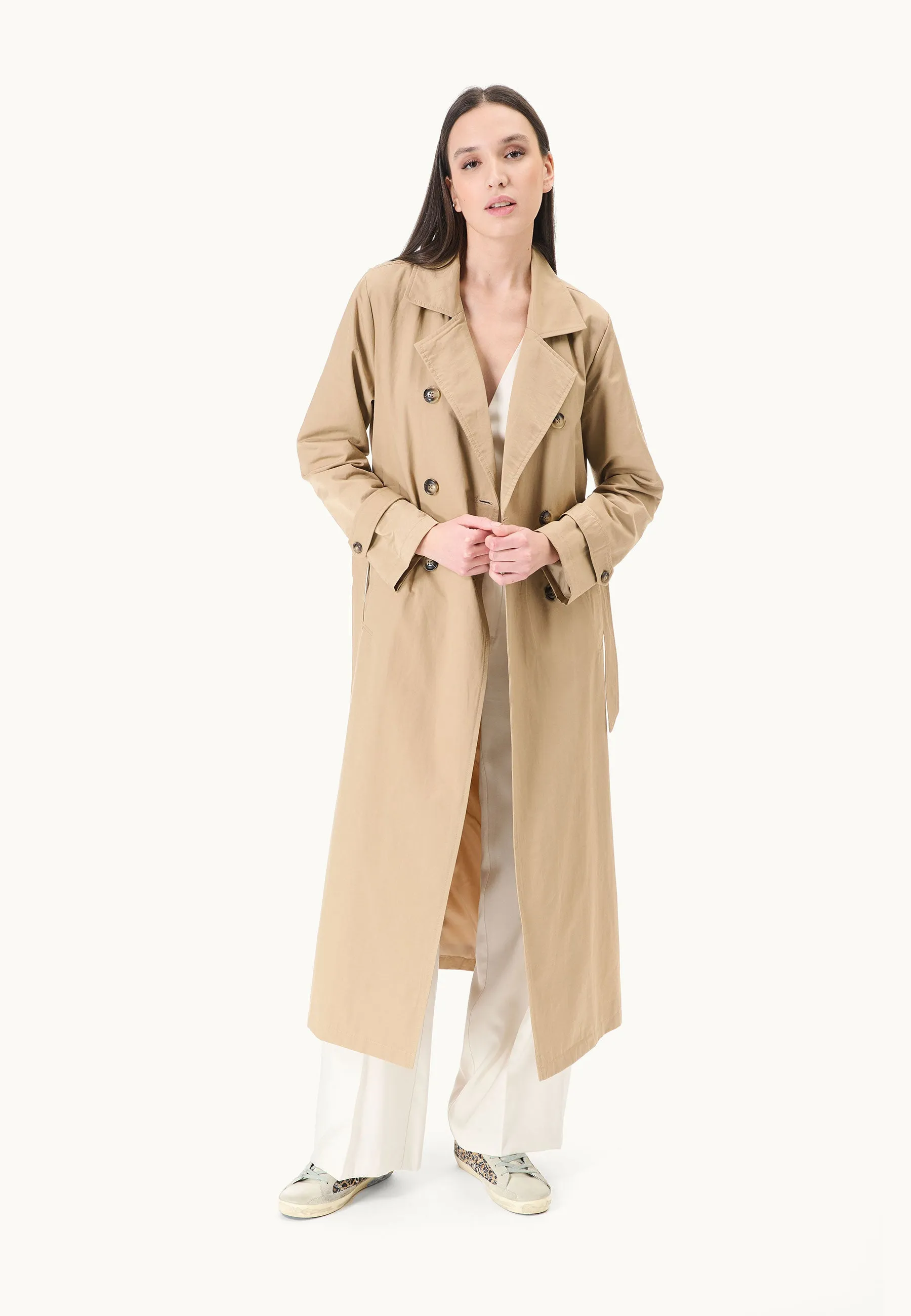 Double-breasted trench coat with belt.