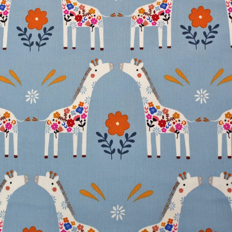 Dressmaking Fabric - Pale Blue Corduroy with Kissing Giraffes