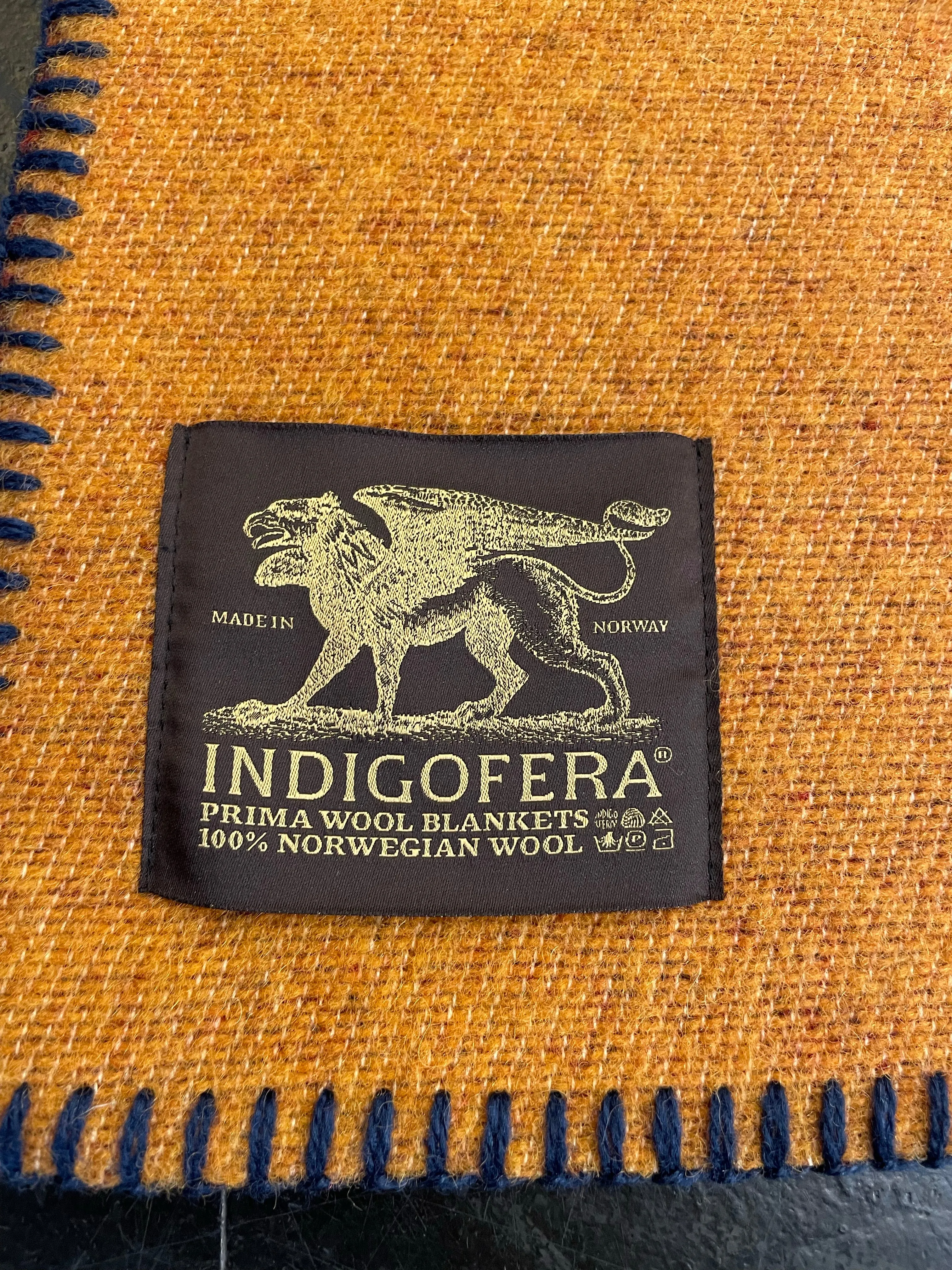 Indigofera Eagle Blanket: Orange, Navy, and Wine Color