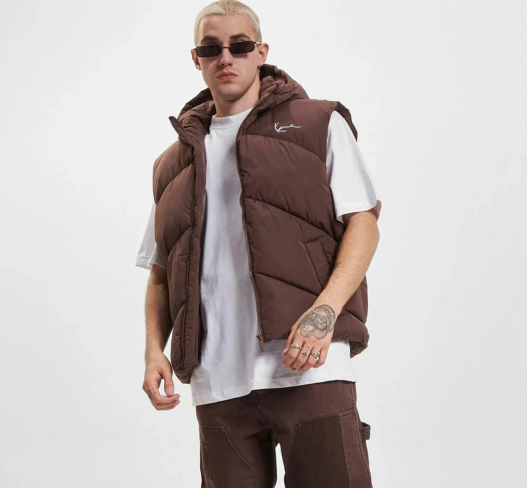 Karl Kani Puffer Vest Chest Signature - Results: Karl Kani Chest Signature Puffer Vest (Available at [specified retailer])