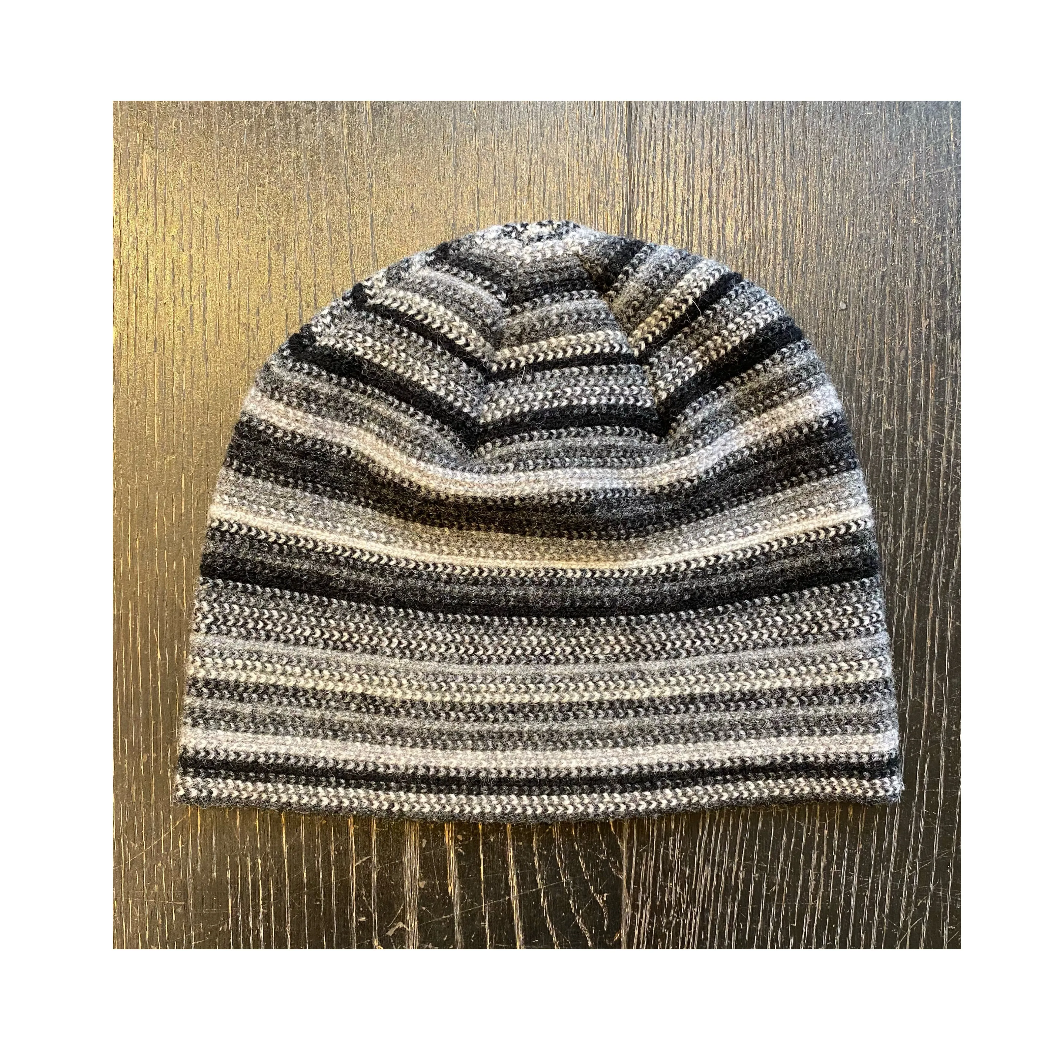 Lambswool Beanie Hat - Black can be rewritten as Black Lambswool Beanie Hat.