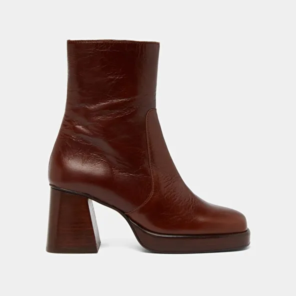 Platform ankle boots in brown distressed leather