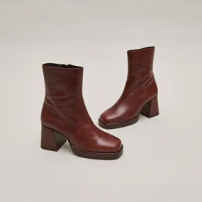 Platform ankle boots in brown distressed leather