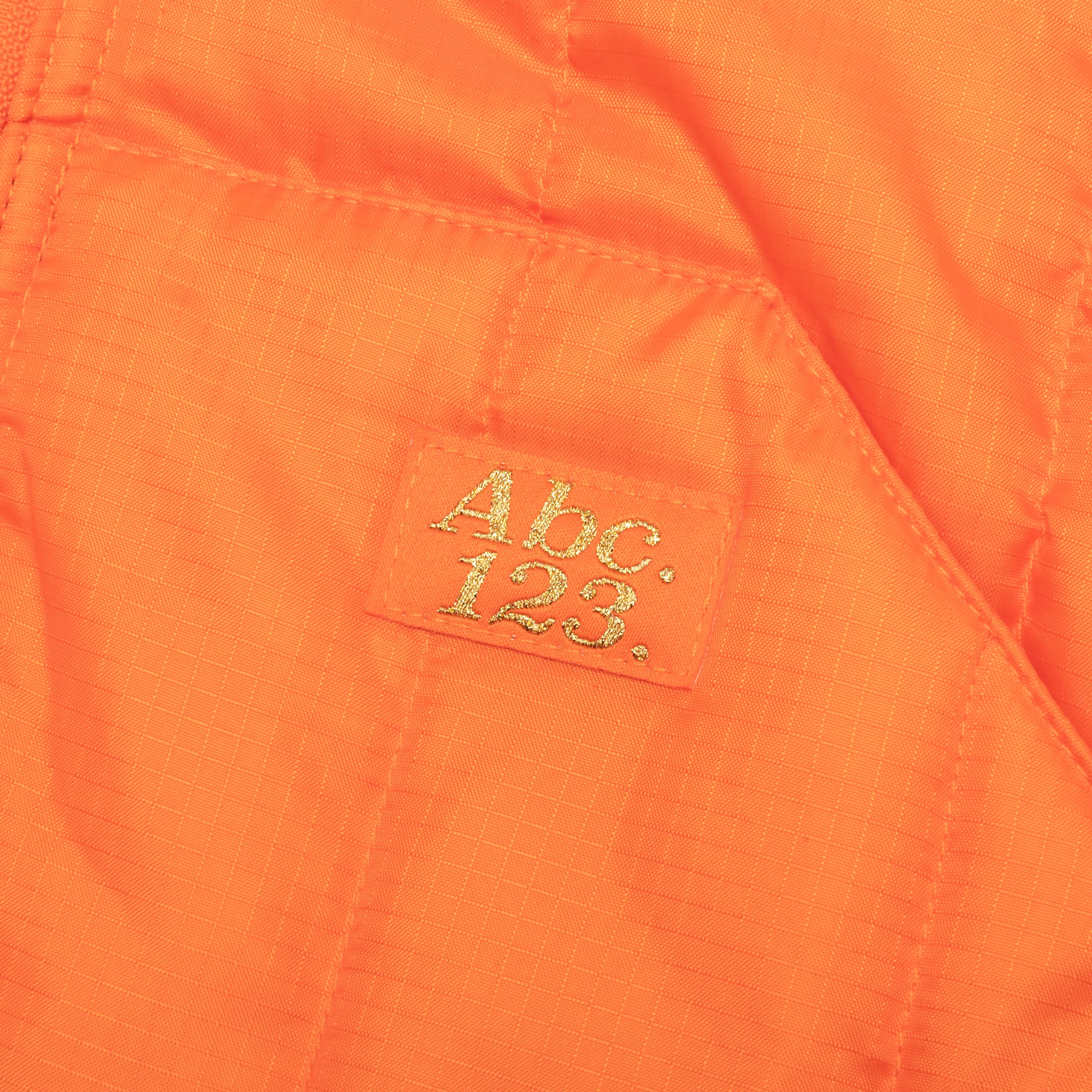 Puffer Vest in Carnelian Orange