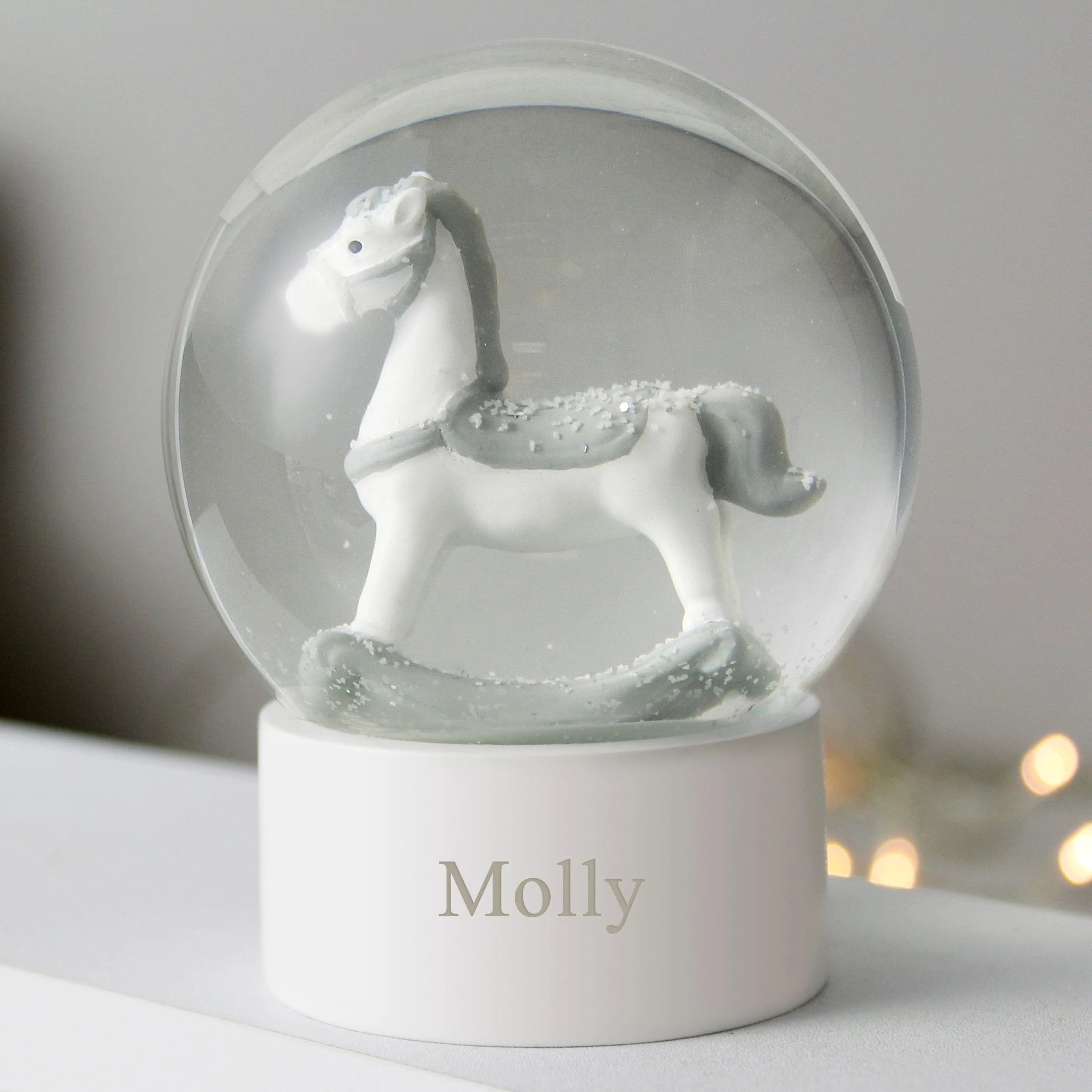 Rocking Horse Snow Globe with Personalized Name and Glitter.