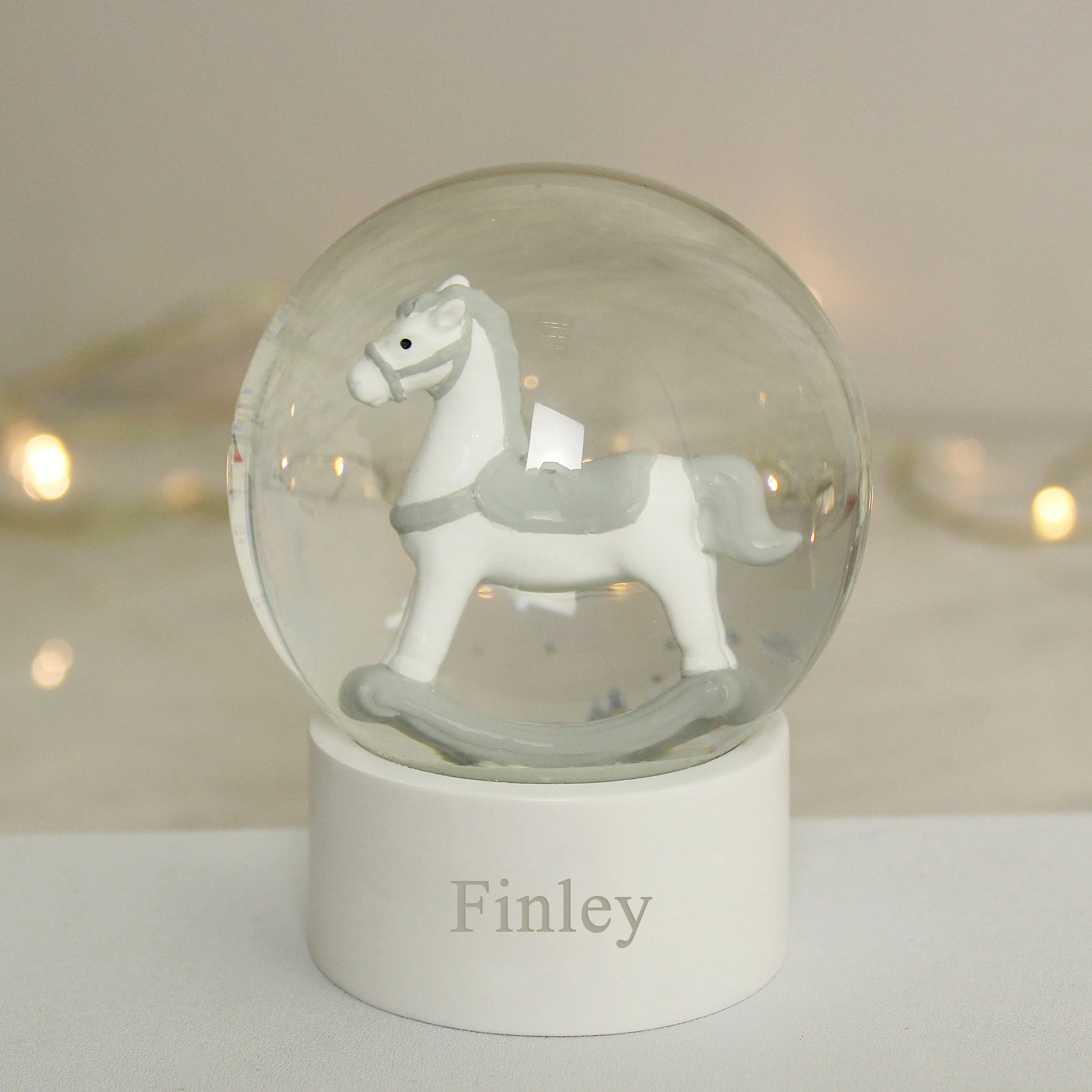 Rocking Horse Snow Globe with Personalized Name and Glitter.