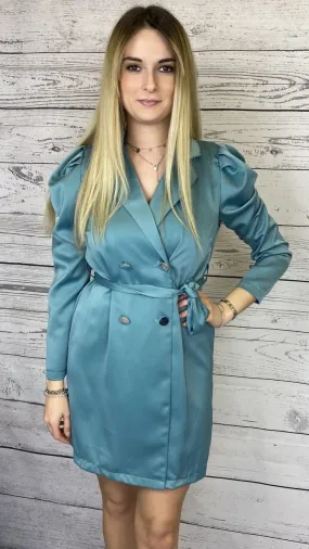 Turquoise trench coat with silver buttons.