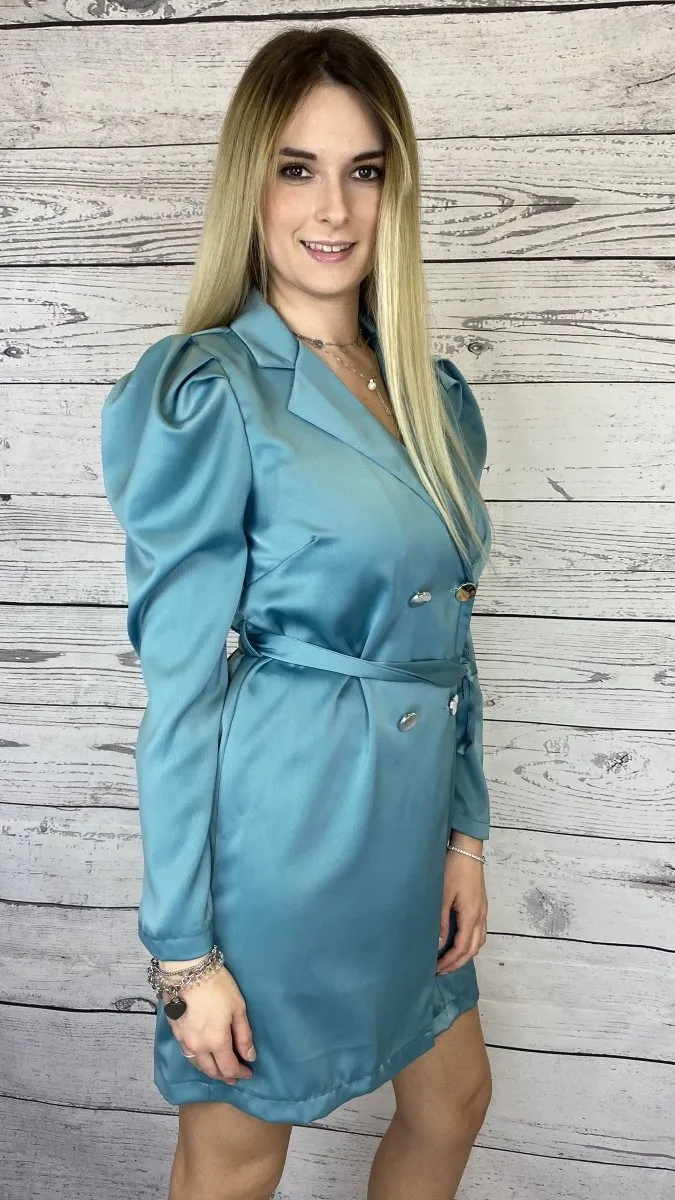 Turquoise trench coat with silver buttons.