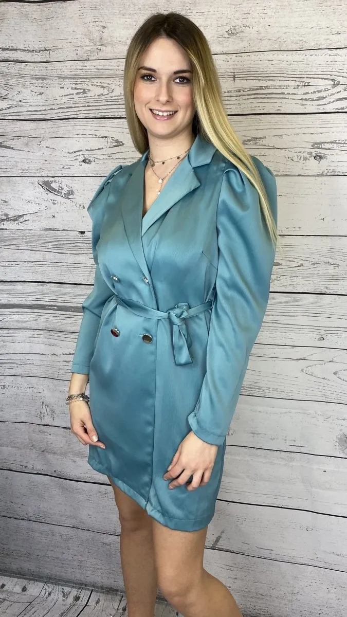 Turquoise trench coat with silver buttons.